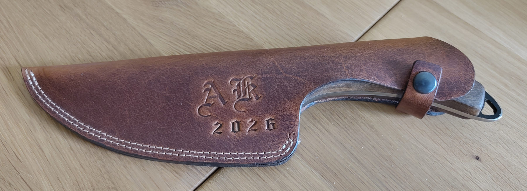 Messer in Lederscheide aufgearbeitetes Messer in Lederscheide